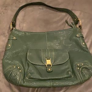 The SAK hobo dark green leather shoulder bag